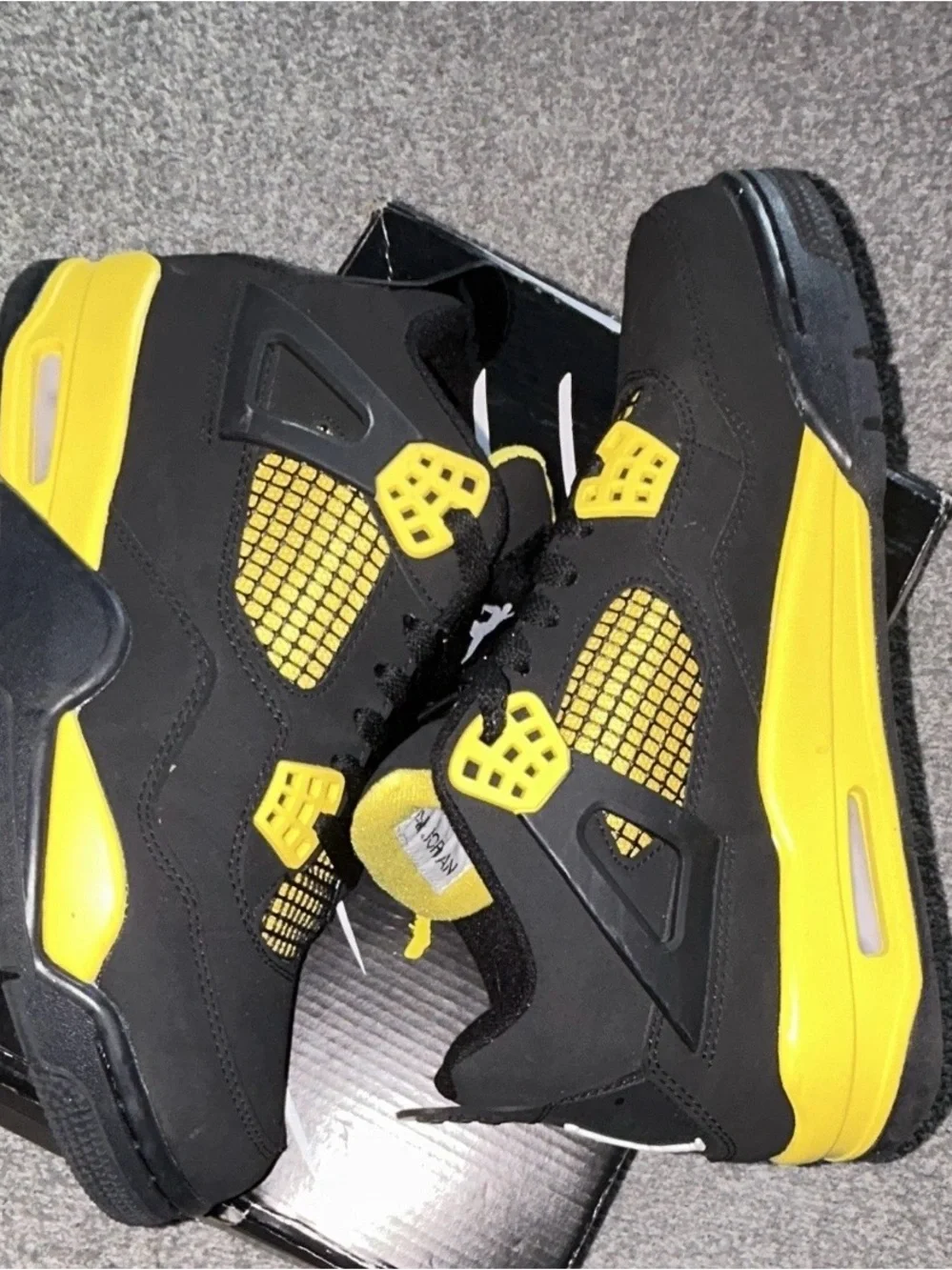 Jordan Retro 4 Black and Yellow Sneakers